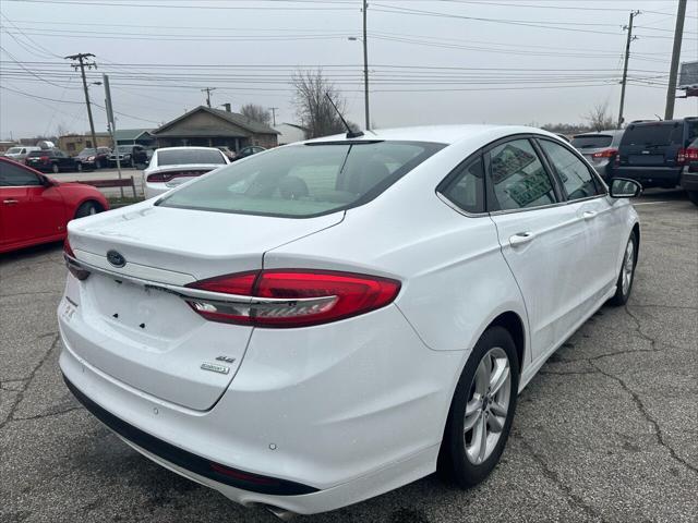 used 2018 Ford Fusion car, priced at $8,999