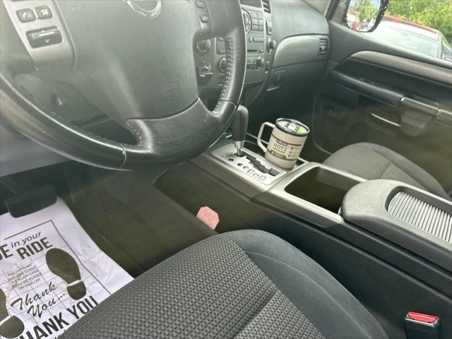 used 2012 Nissan Armada car, priced at $7,999