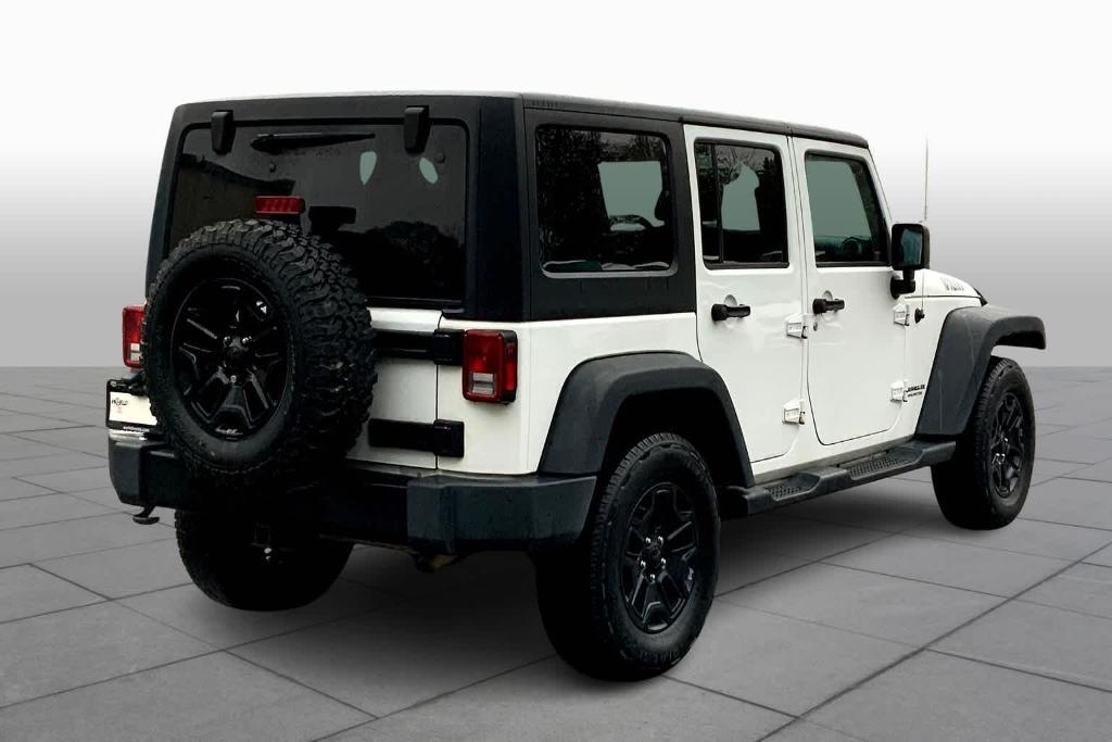 used 2015 Jeep Wrangler Unlimited car, priced at $14,683