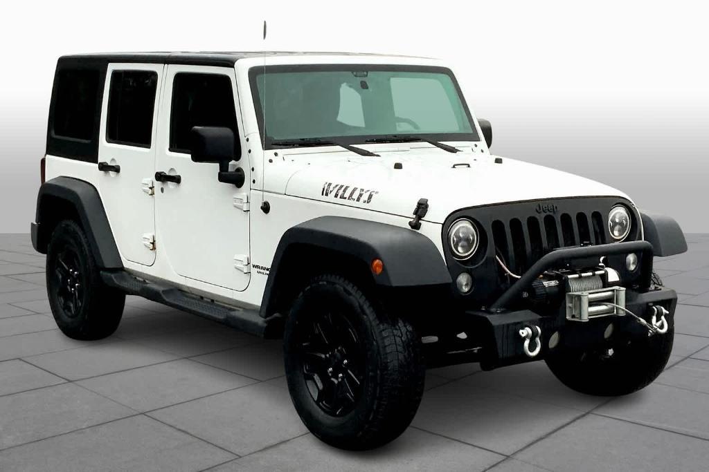 used 2015 Jeep Wrangler Unlimited car, priced at $14,683