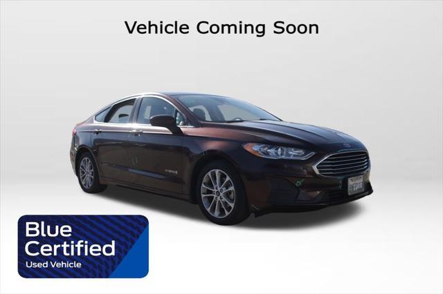 used 2019 Ford Fusion Hybrid car, priced at $10,000