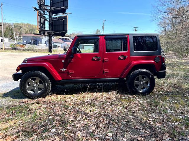 used 2013 Jeep Wrangler Unlimited car, priced at $13,995