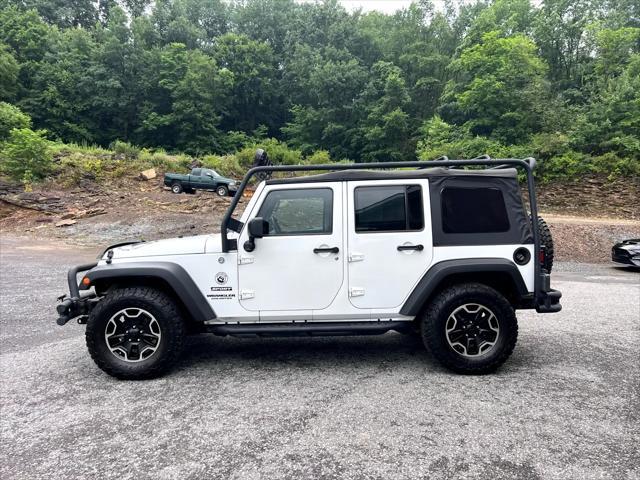 used 2014 Jeep Wrangler Unlimited car, priced at $14,995