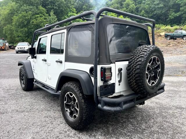 used 2014 Jeep Wrangler Unlimited car, priced at $14,995