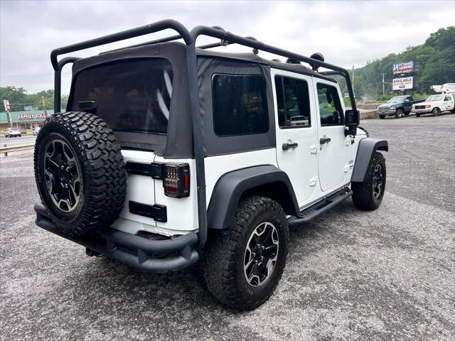 used 2014 Jeep Wrangler Unlimited car, priced at $14,995