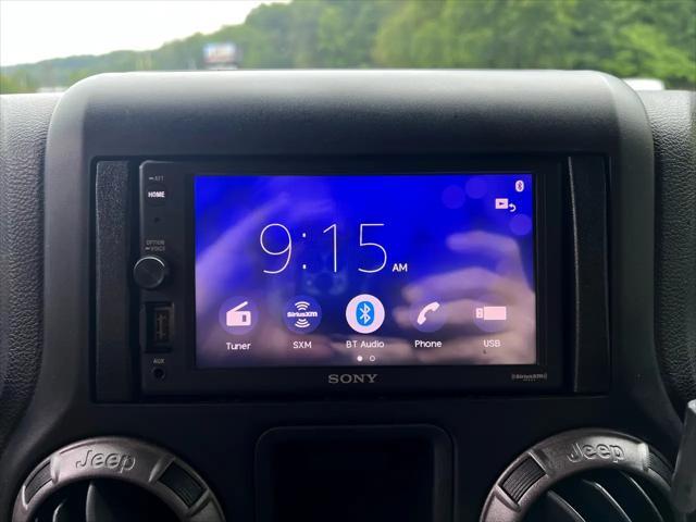 used 2014 Jeep Wrangler Unlimited car, priced at $14,995