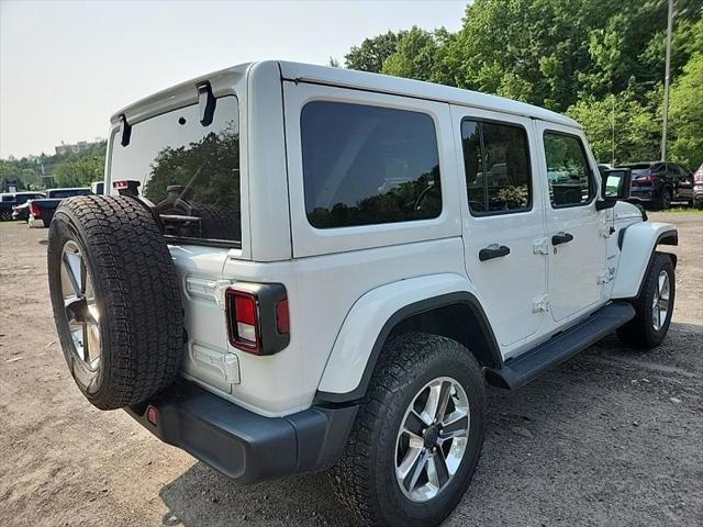 used 2021 Jeep Wrangler Unlimited car, priced at $31,373
