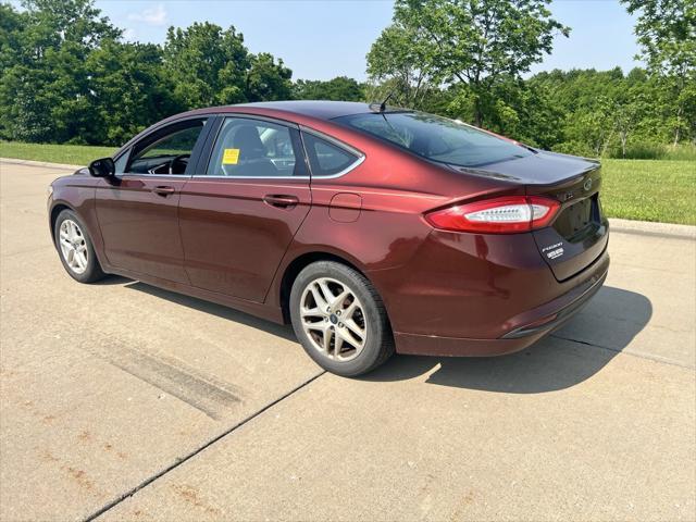 used 2016 Ford Fusion car, priced at $7,133