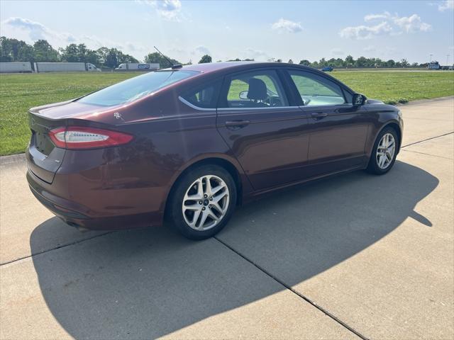 used 2016 Ford Fusion car, priced at $7,133