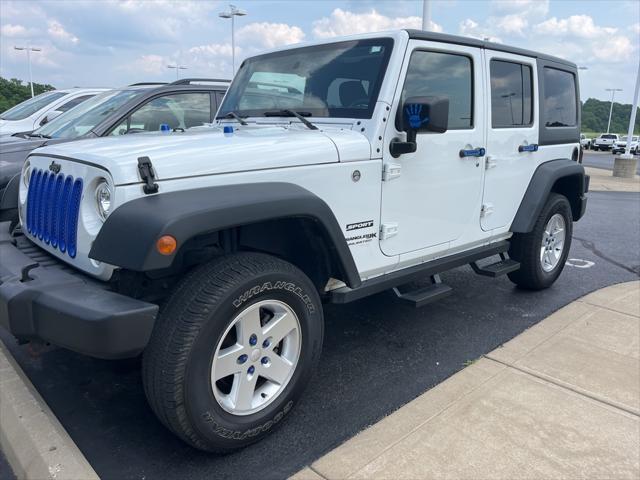 used 2018 Jeep Wrangler JK Unlimited car, priced at $23,947