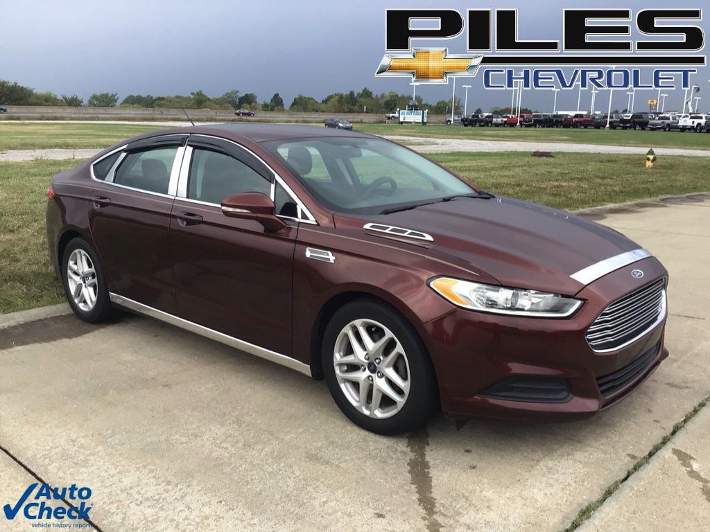 used 2016 Ford Fusion car, priced at $7,139