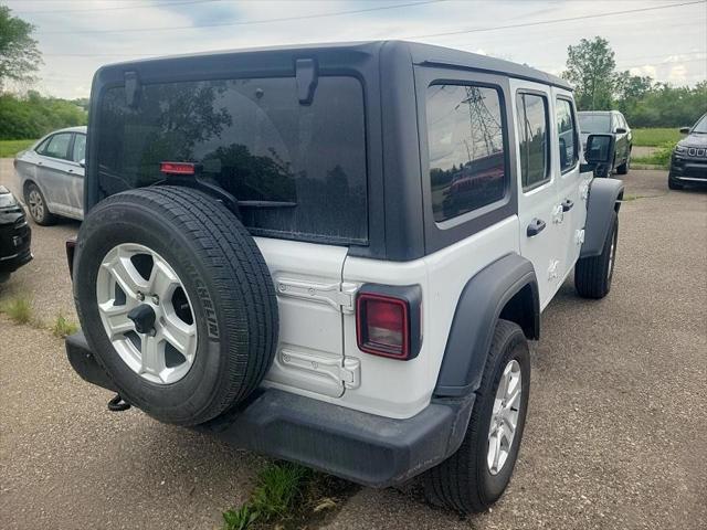 used 2022 Jeep Wrangler Unlimited car, priced at $31,386