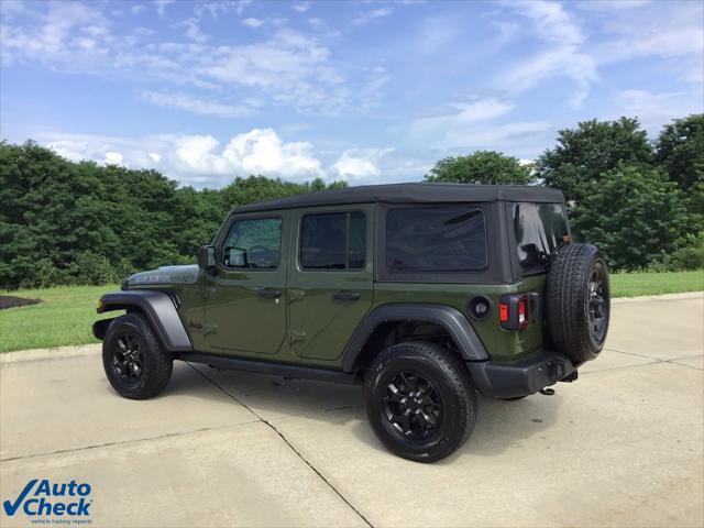 used 2023 Jeep Wrangler car, priced at $35,037
