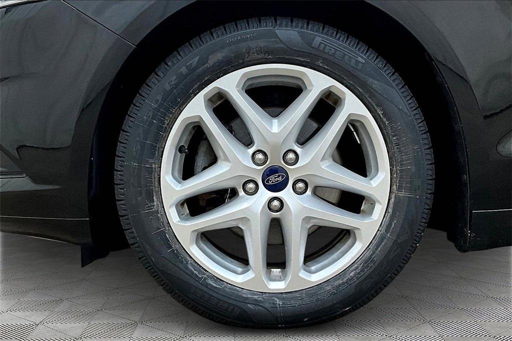 used 2016 Ford Fusion car, priced at $7,490