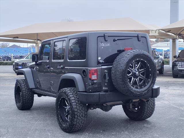 used 2017 Jeep Wrangler Unlimited car, priced at $23,477