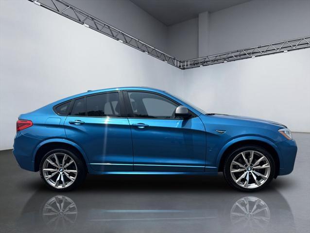 used 2016 BMW X4 car, priced at $17,995