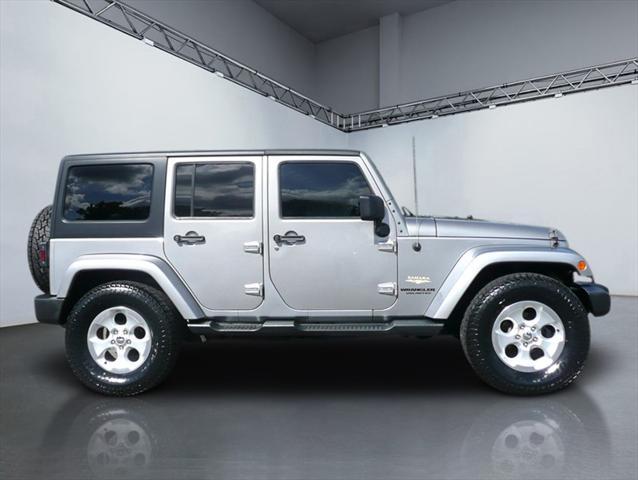 used 2014 Jeep Wrangler Unlimited car, priced at $16,984