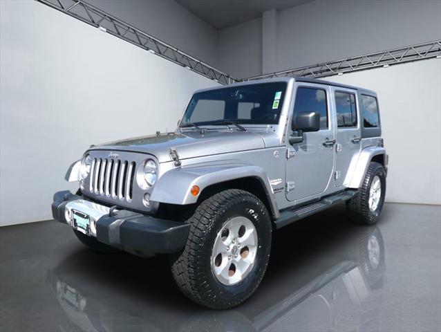 used 2014 Jeep Wrangler Unlimited car, priced at $16,984