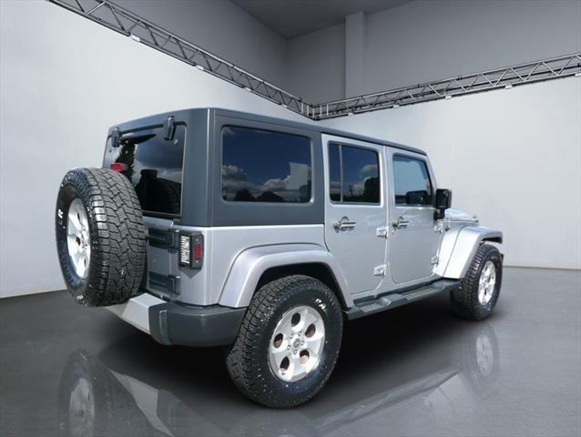 used 2014 Jeep Wrangler Unlimited car, priced at $16,984