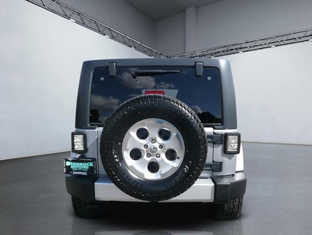 used 2014 Jeep Wrangler Unlimited car, priced at $16,984