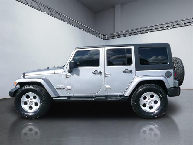 used 2014 Jeep Wrangler Unlimited car, priced at $16,984