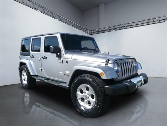 used 2014 Jeep Wrangler Unlimited car, priced at $16,984