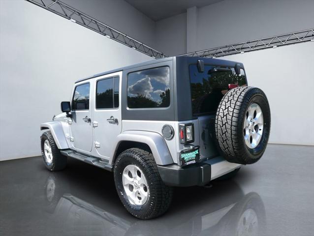 used 2014 Jeep Wrangler Unlimited car, priced at $16,984