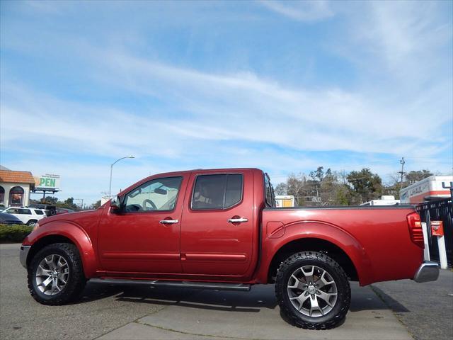 used 2014 Nissan Frontier car, priced at $14,988