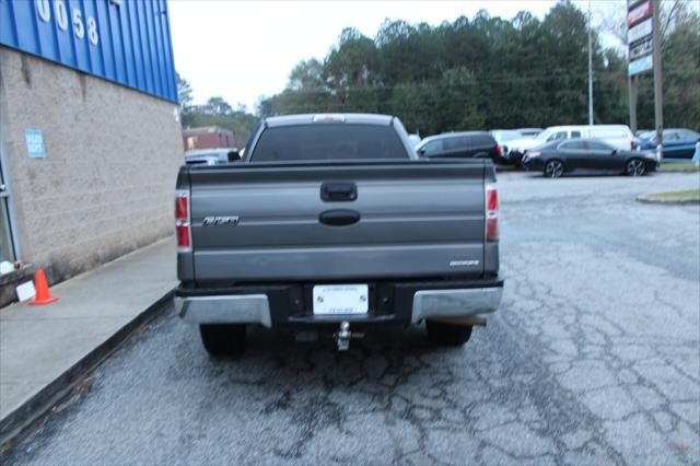 used 2014 Ford F-150 car, priced at $9,999