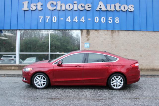 used 2015 Ford Fusion car, priced at $10,999