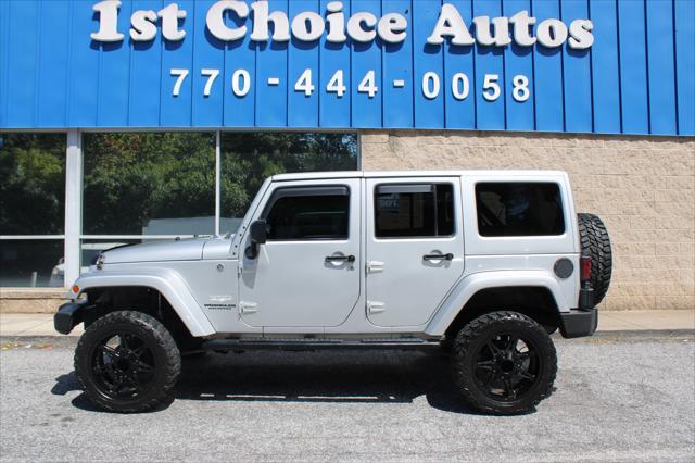 used 2012 Jeep Wrangler Unlimited car, priced at $9,000