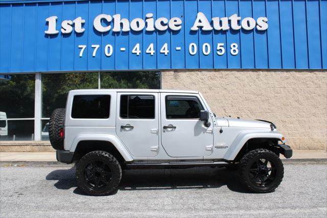 used 2012 Jeep Wrangler Unlimited car, priced at $9,000