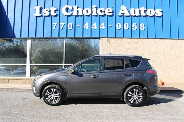 used 2018 Toyota RAV4 car, priced at $15,999