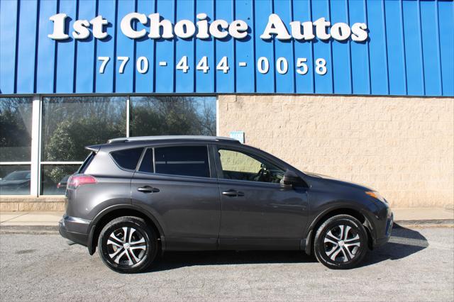 used 2018 Toyota RAV4 car, priced at $15,999