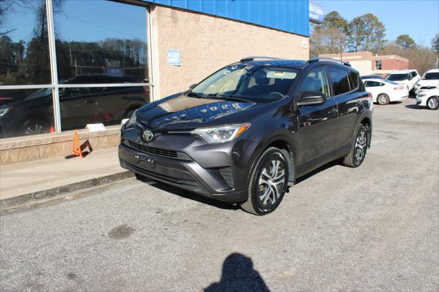 used 2018 Toyota RAV4 car, priced at $15,999