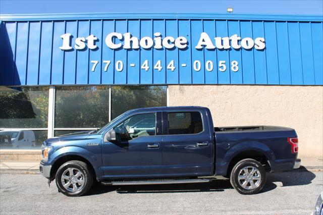 used 2018 Ford F-150 car, priced at $14,999