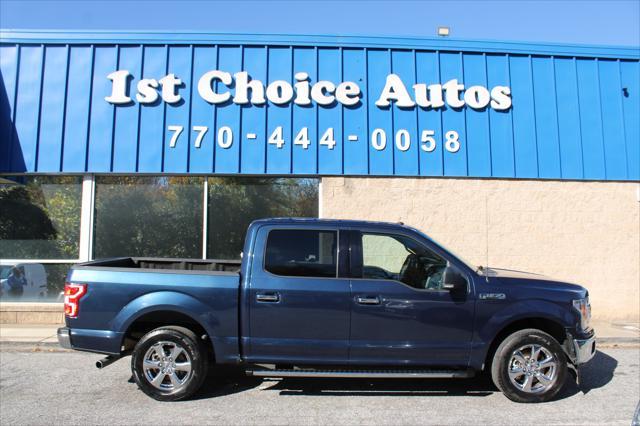 used 2018 Ford F-150 car, priced at $14,999