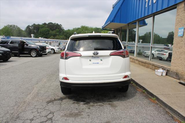 used 2018 Toyota RAV4 car, priced at $12,999