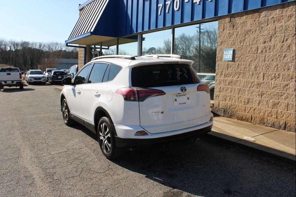 used 2016 Toyota RAV4 car, priced at $9,999