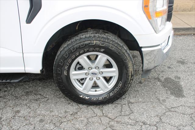 used 2021 Ford F-150 car, priced at $15,999