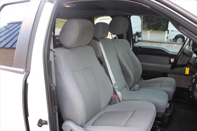 used 2014 Ford F-150 car, priced at $15,000