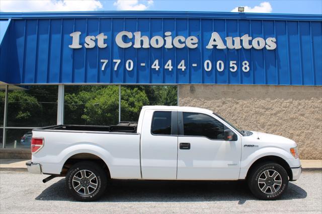 used 2014 Ford F-150 car, priced at $15,000