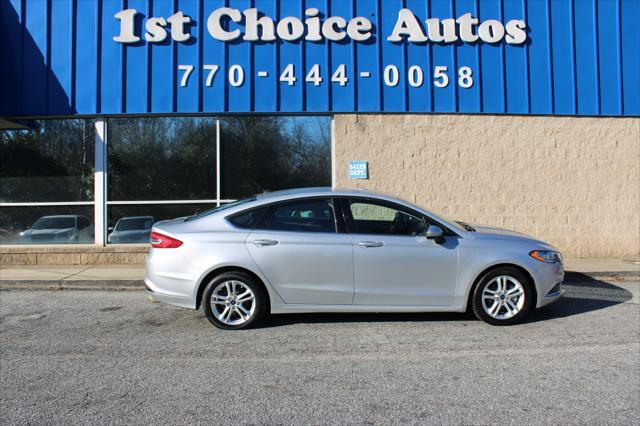 used 2018 Ford Fusion car, priced at $10,999