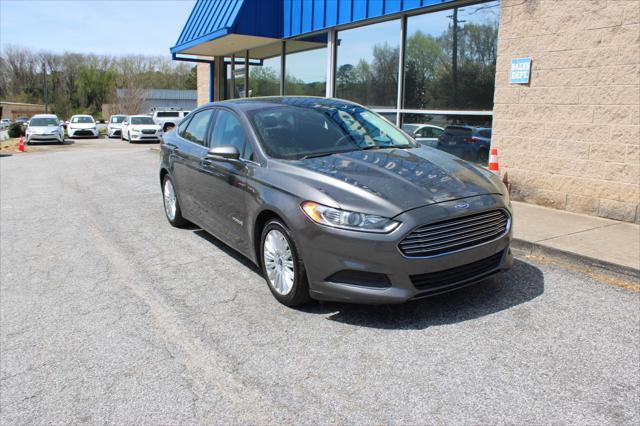 used 2015 Ford Fusion Hybrid car, priced at $15,000