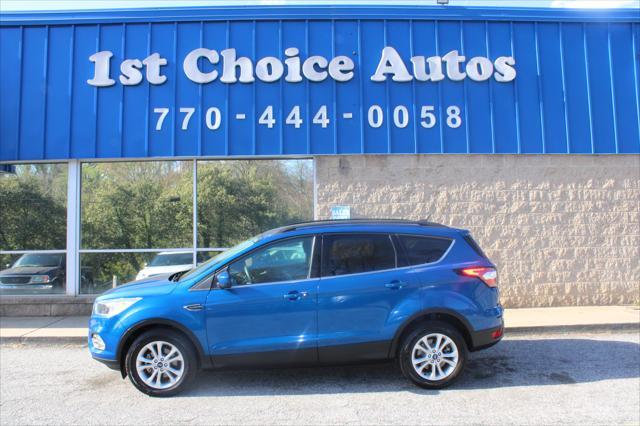 used 2018 Ford Escape car, priced at $8,888