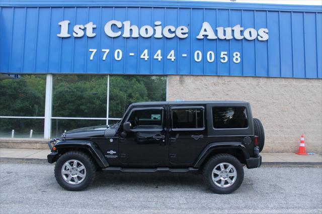 used 2014 Jeep Wrangler Unlimited car, priced at $15,999