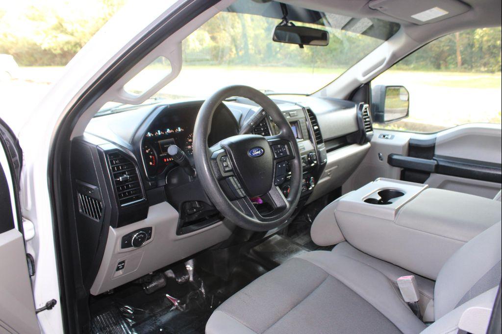used 2018 Ford F-150 car, priced at $6,999