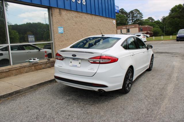 used 2018 Ford Fusion Hybrid car, priced at $9,999