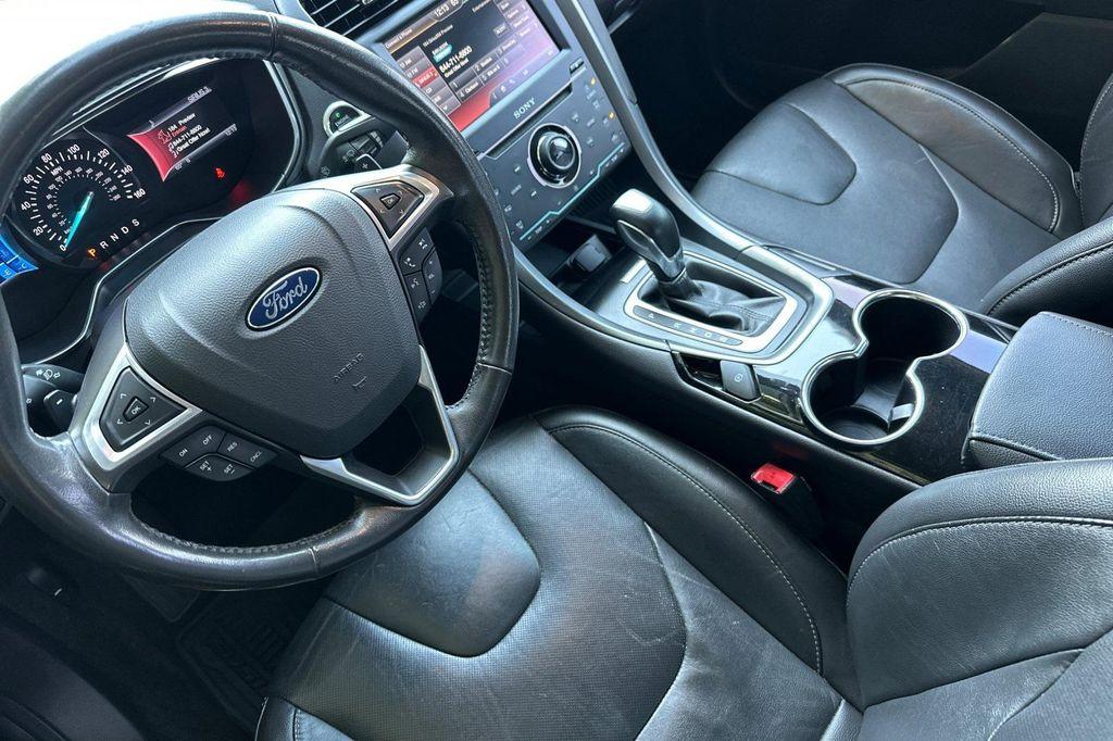 used 2014 Ford Fusion car, priced at $8,890