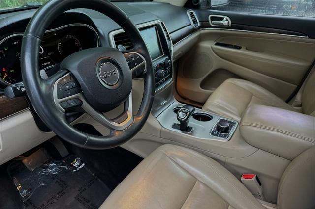 used 2014 Jeep Grand Cherokee car, priced at $13,995